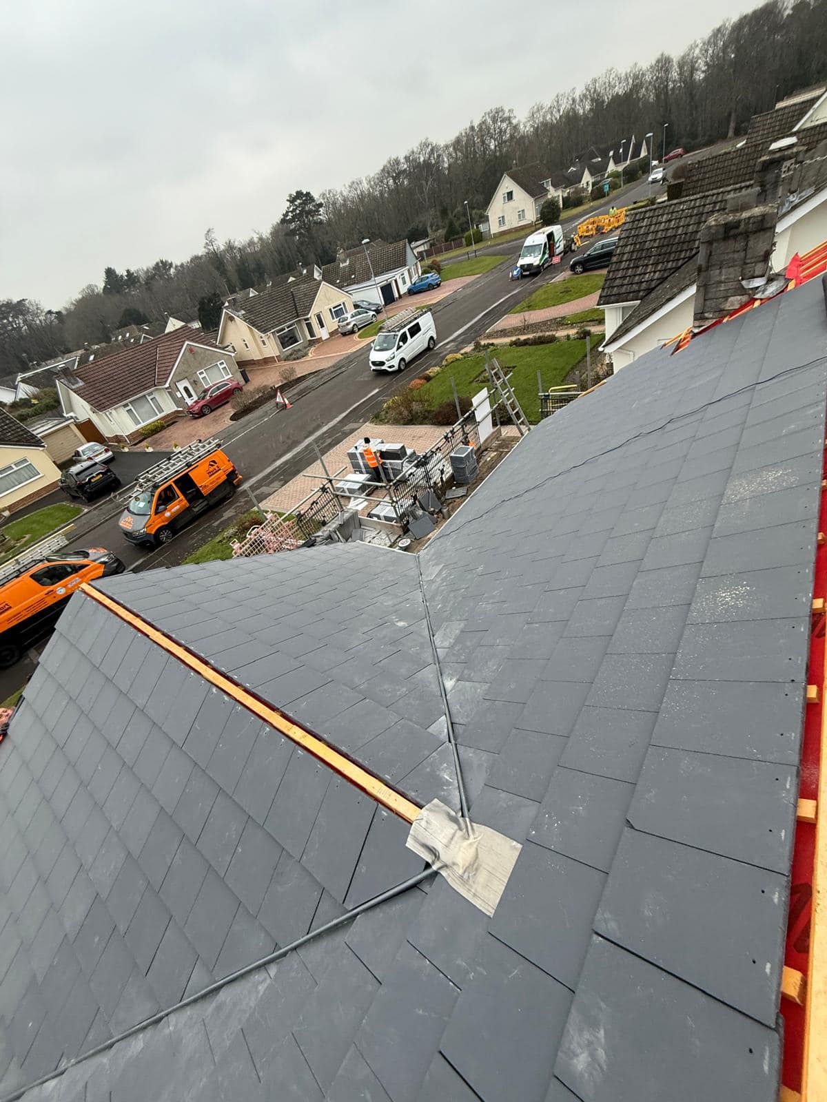 Professional roofers working on a property in London - KS Roof Master
