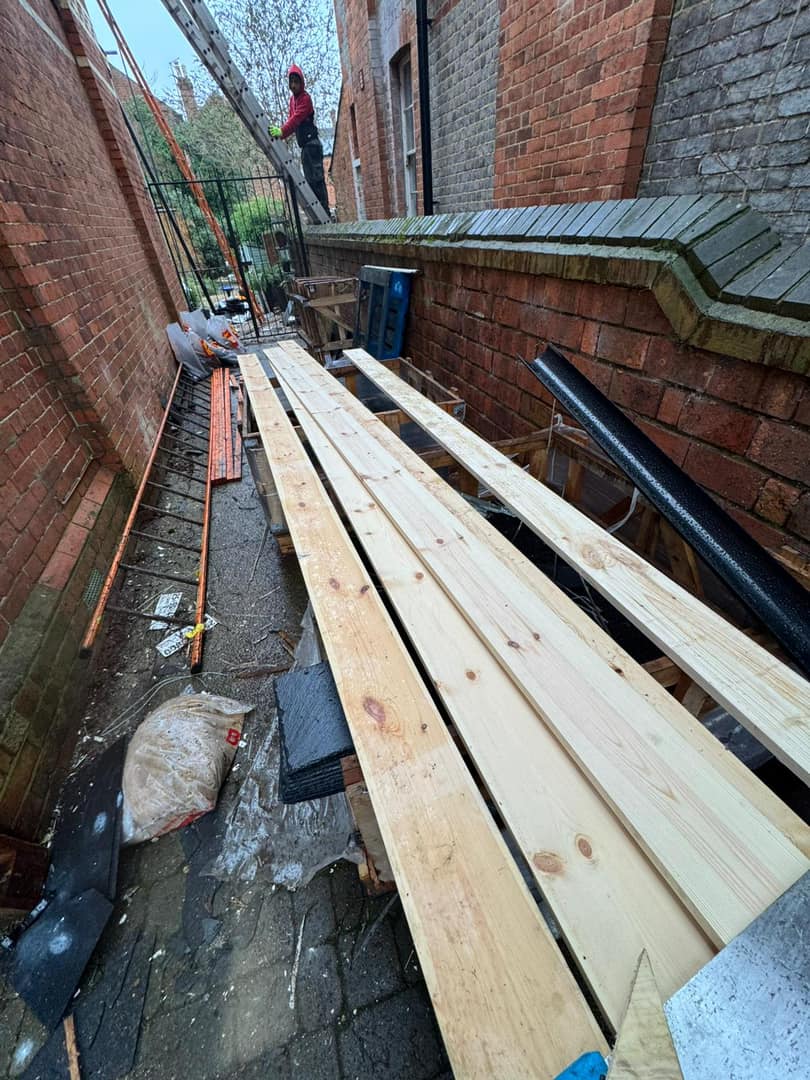 Professional roofers working on a property in London - KS Roof Master