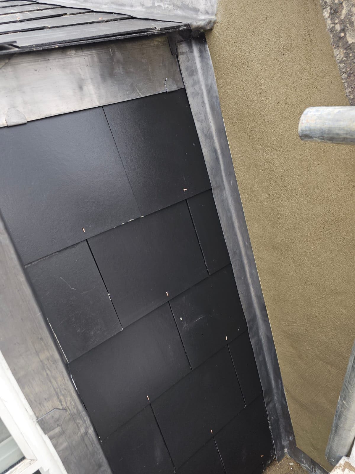 Professional roofers working on a property in London - KS Roof Master