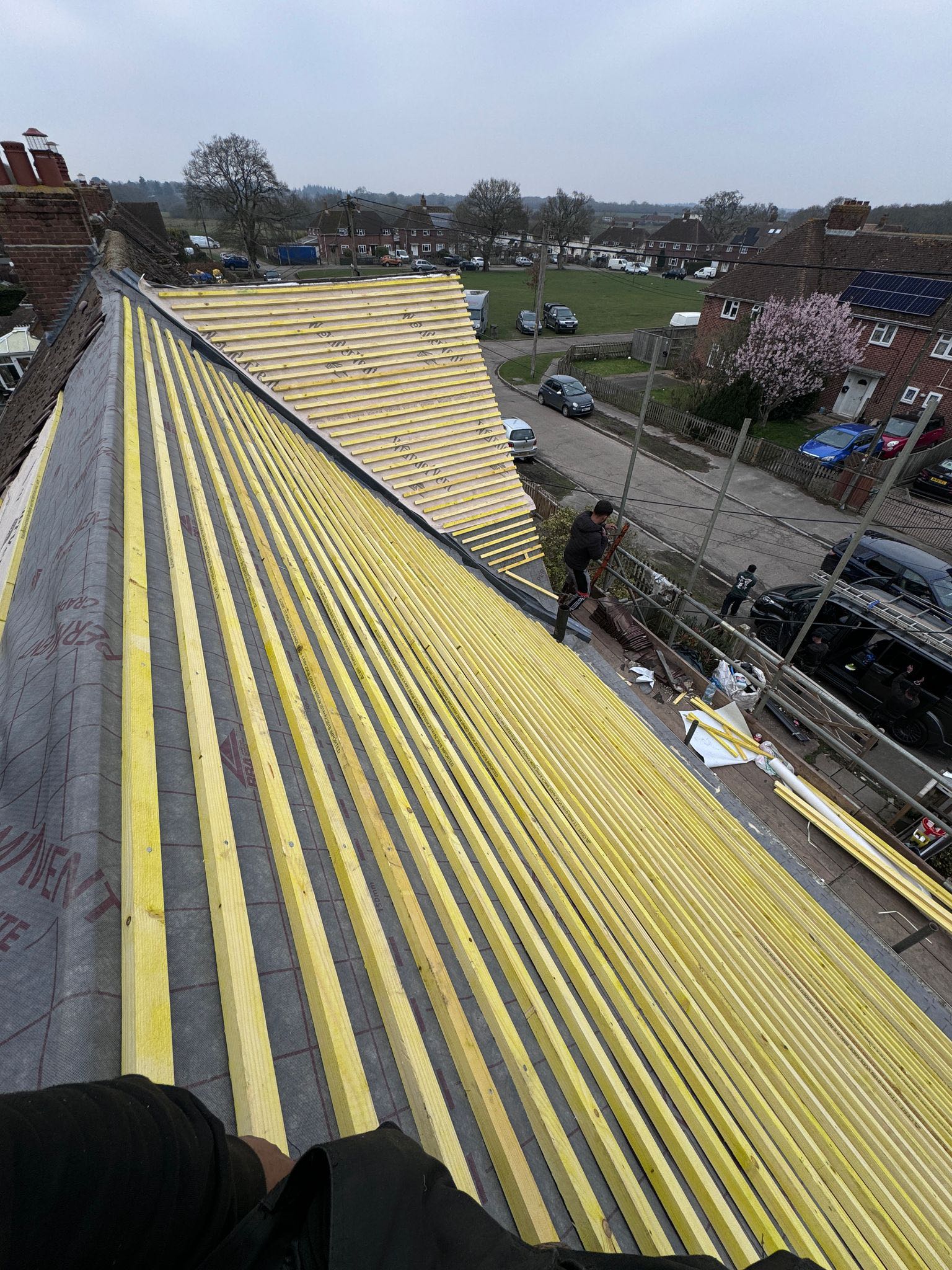 Professional roofers working on a property in London - KS Roof Master