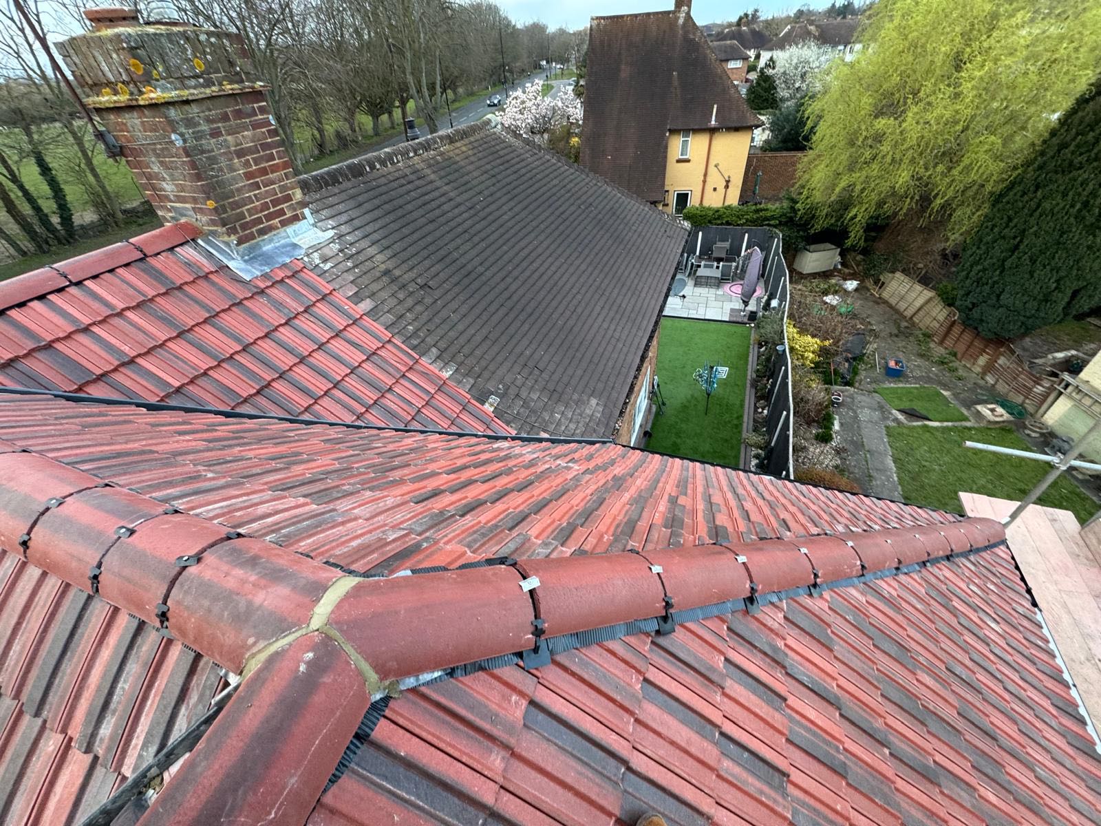 Professional roofers working on a property in London - KS Roof Master