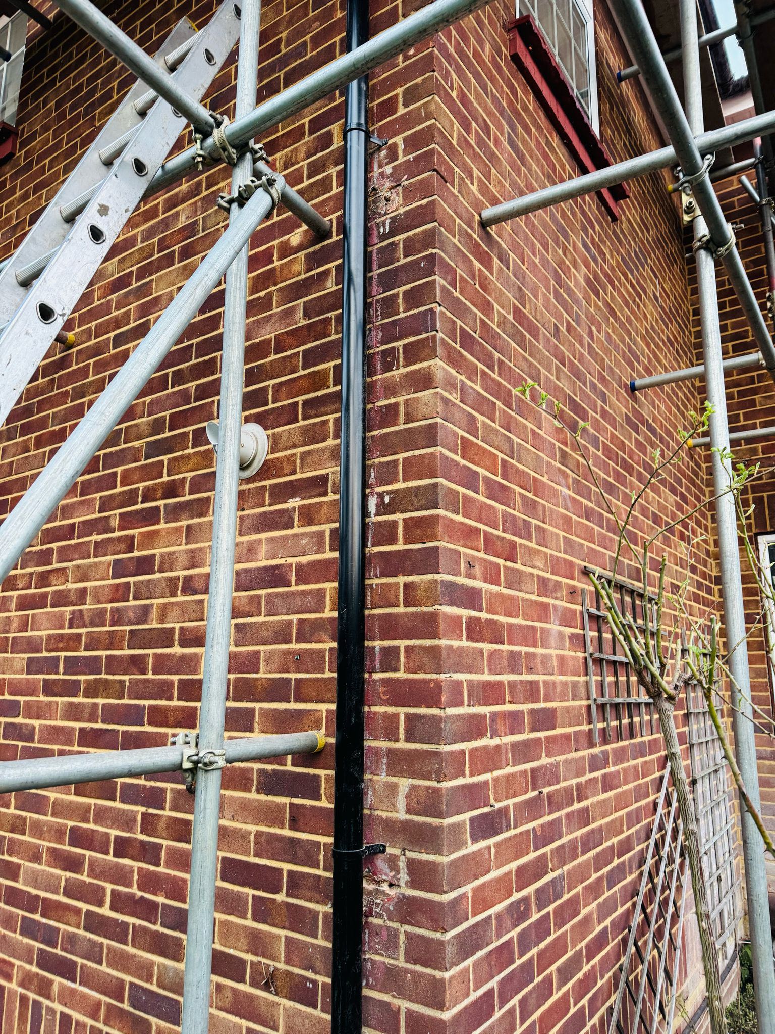 Professional roofers working on a property in London - KS Roof Master