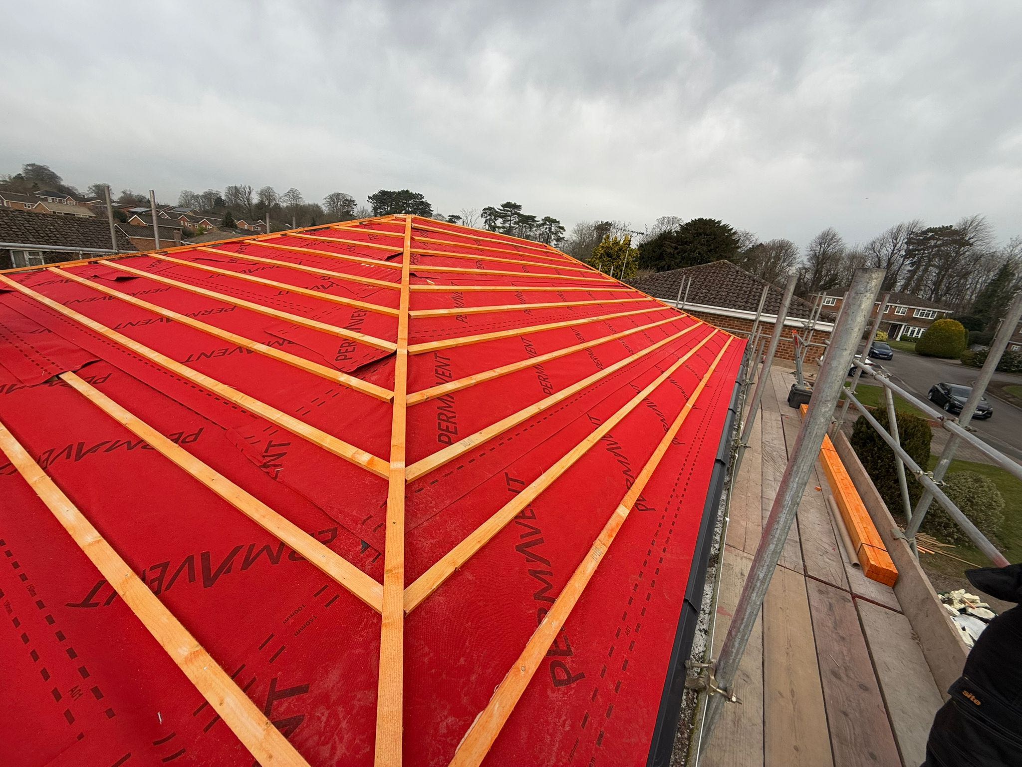 Professional roofers working on a property in London - KS Roof Master