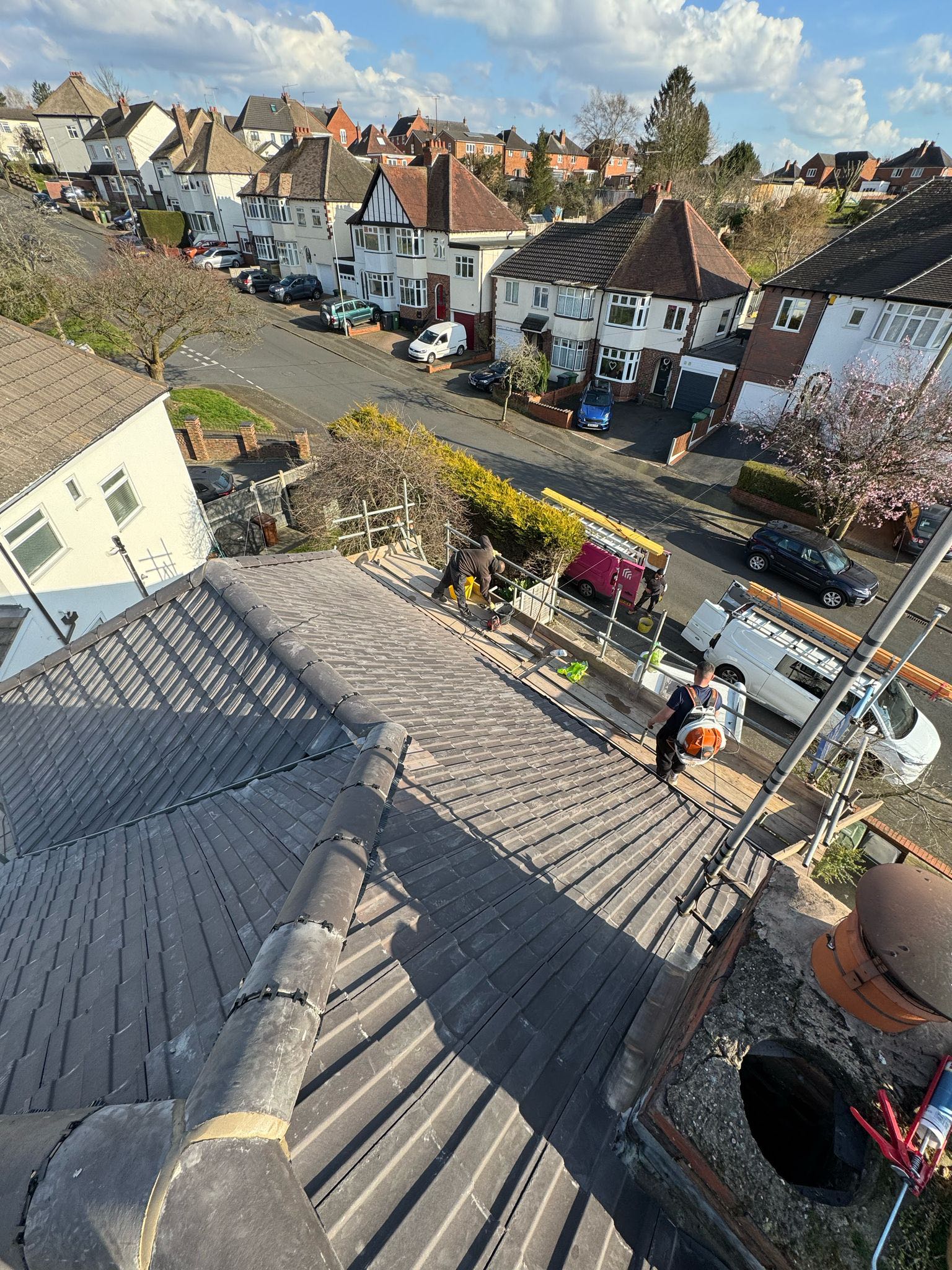 Professional roofers working on a property in London - KS Roof Master