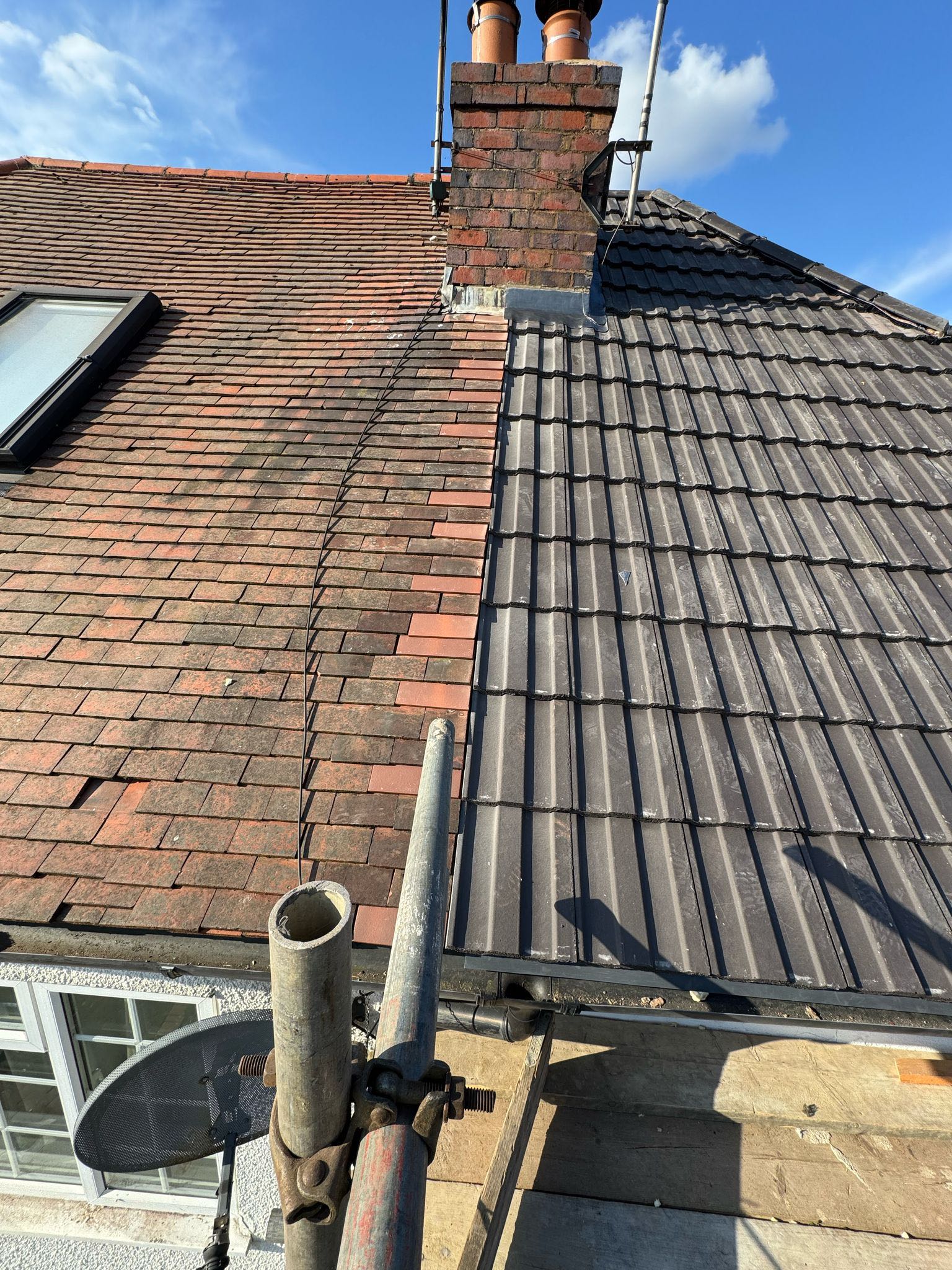Professional roofers working on a property in London - KS Roof Master