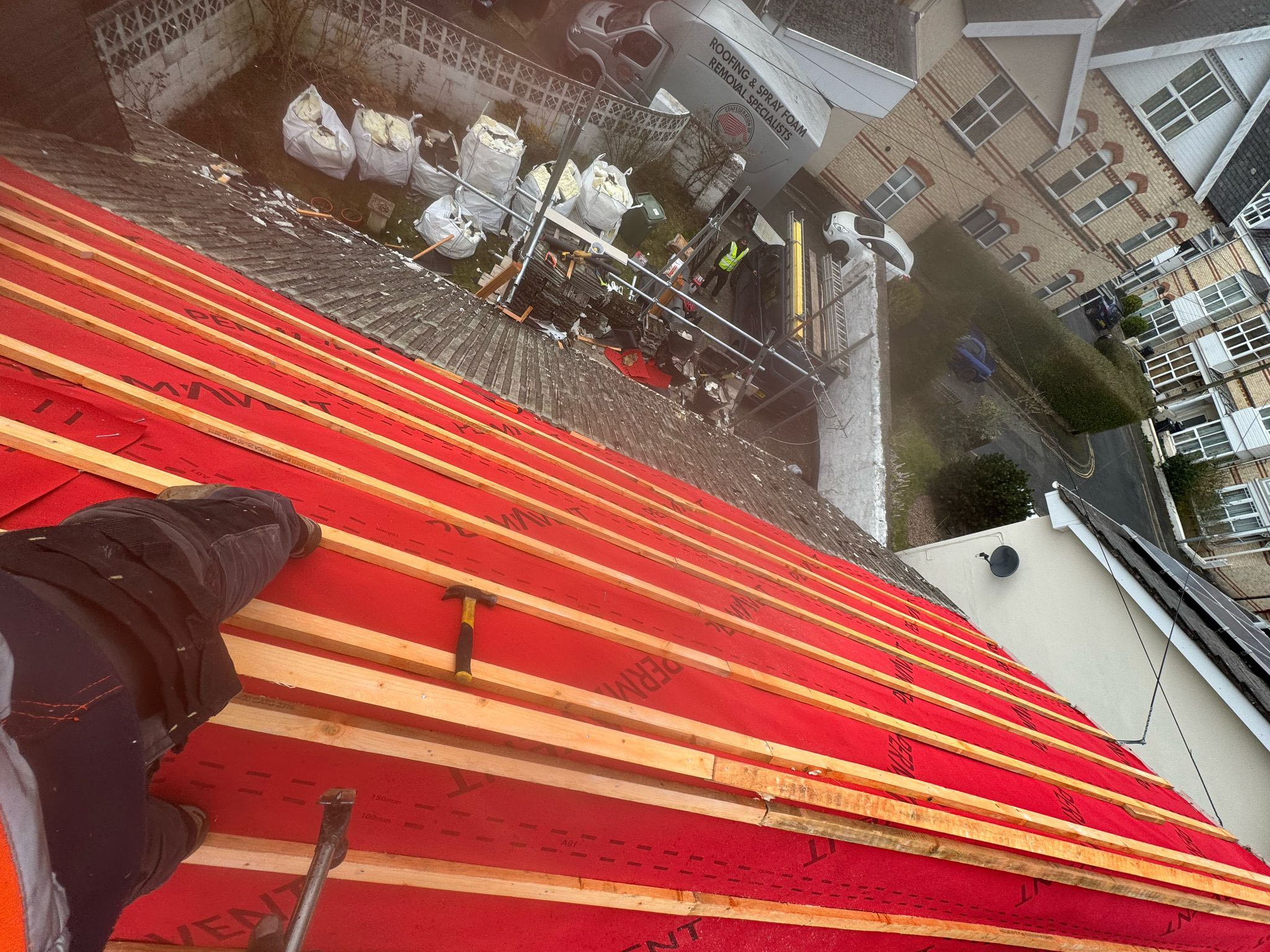 Professional roofers working on a property in London - KS Roof Master