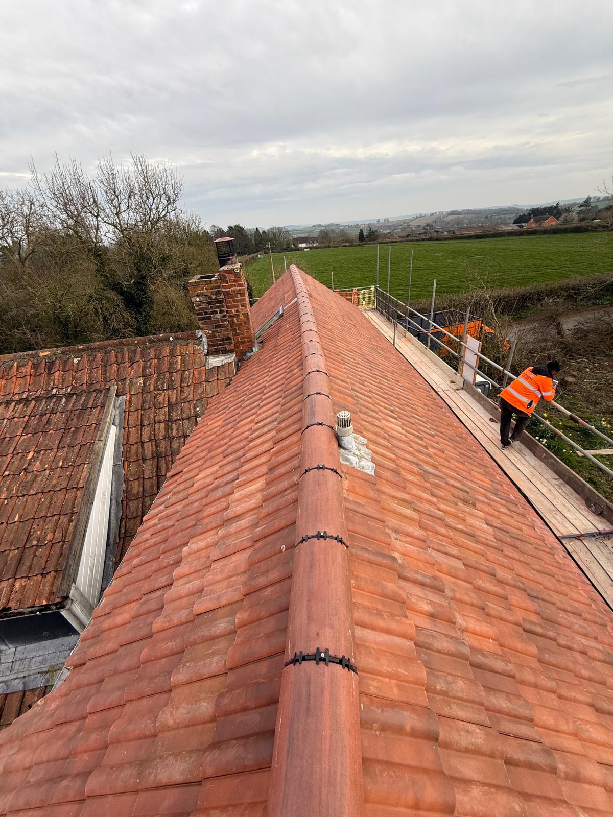 Professional roofers working on a property in London - KS Roof Master