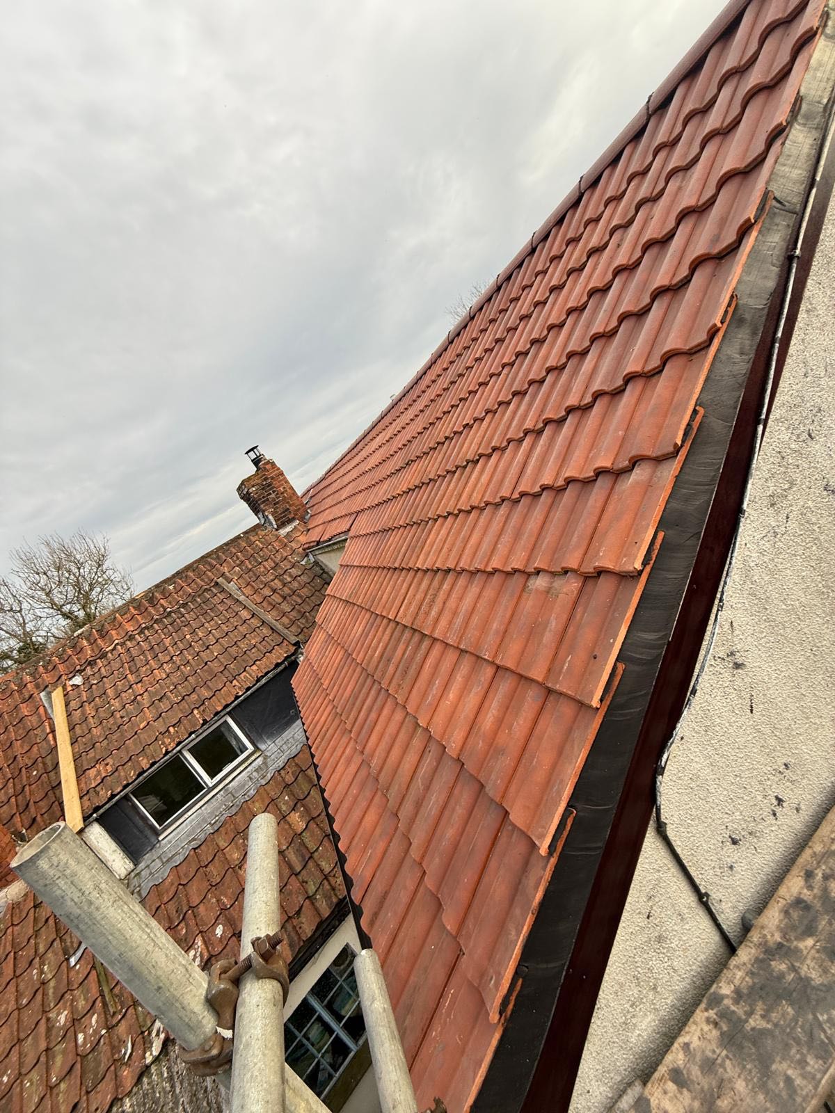 Professional roofers working on a property in London - KS Roof Master