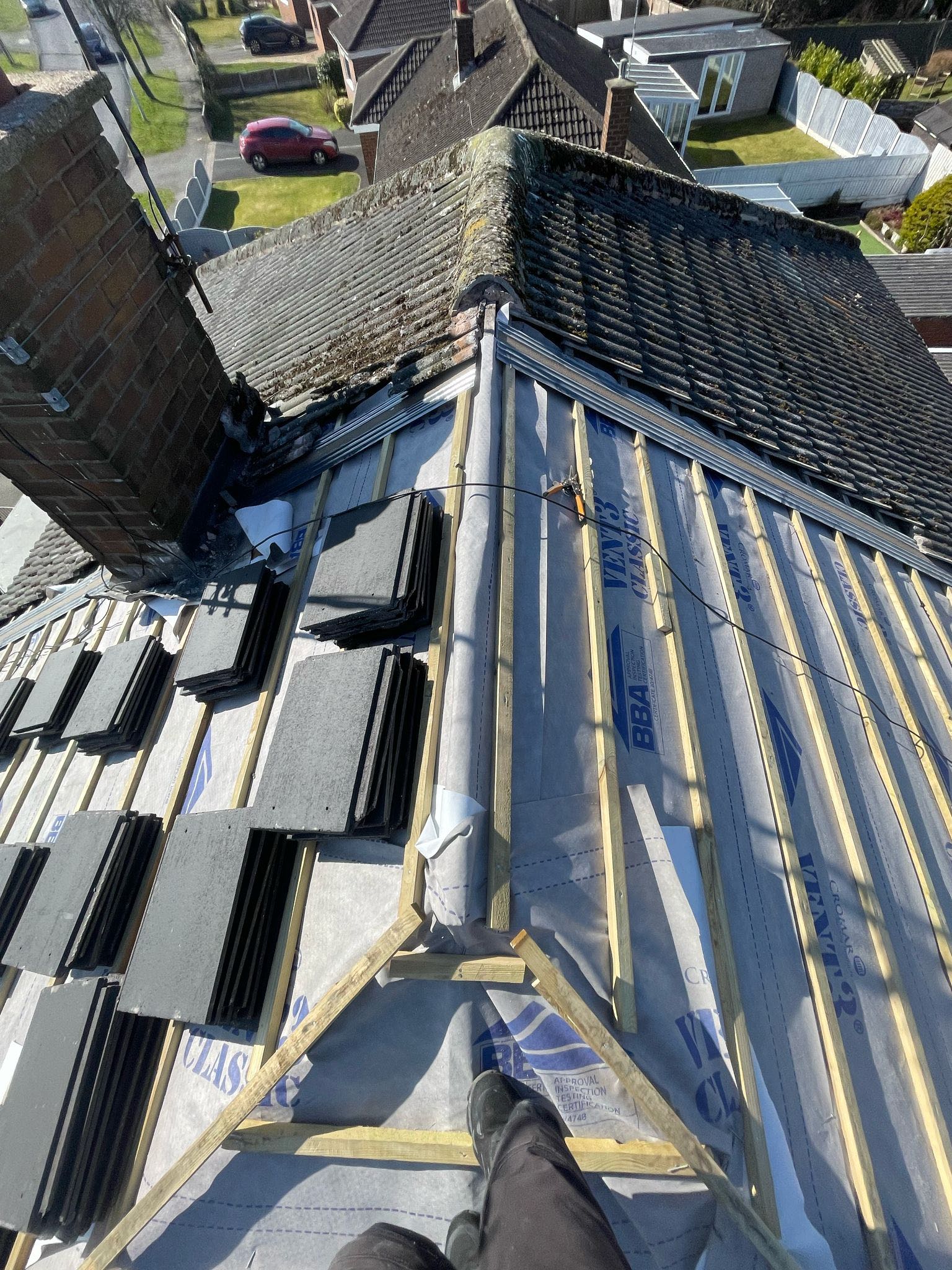 Professional roofers working on a property in London - KS Roof Master