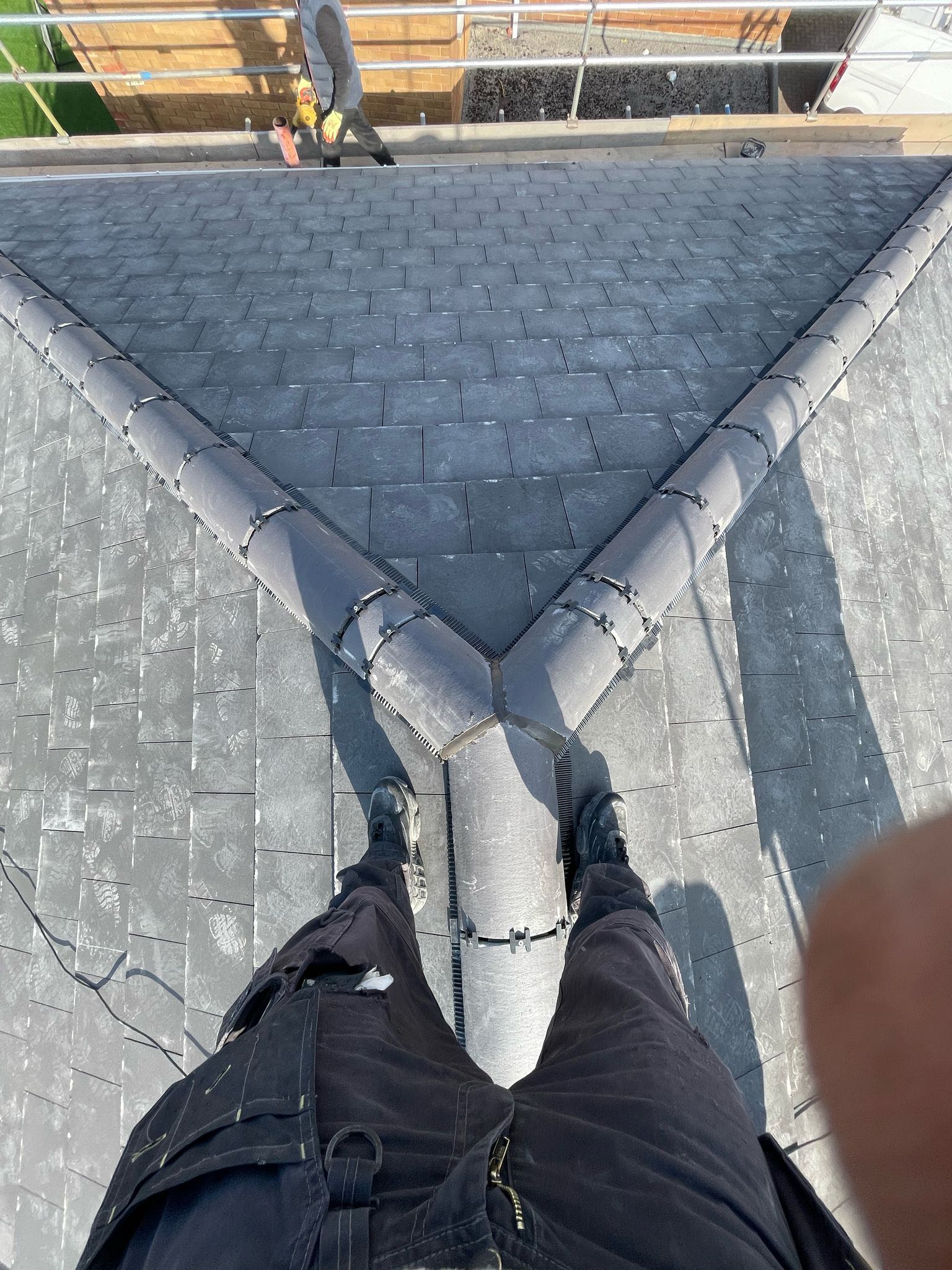 Professional roofers working on a property in London - KS Roof Master