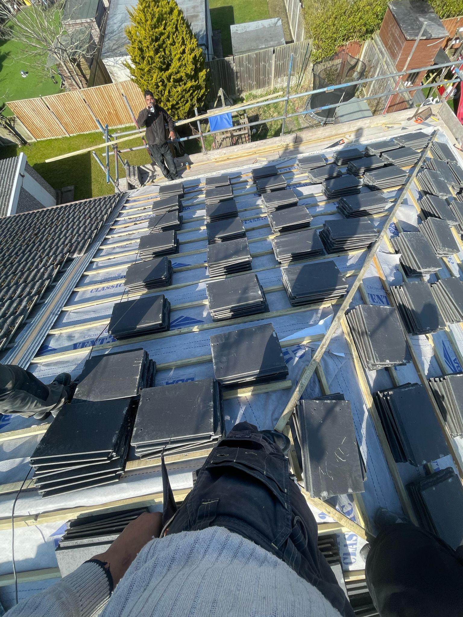 Professional roofers working on a property in London - KS Roof Master