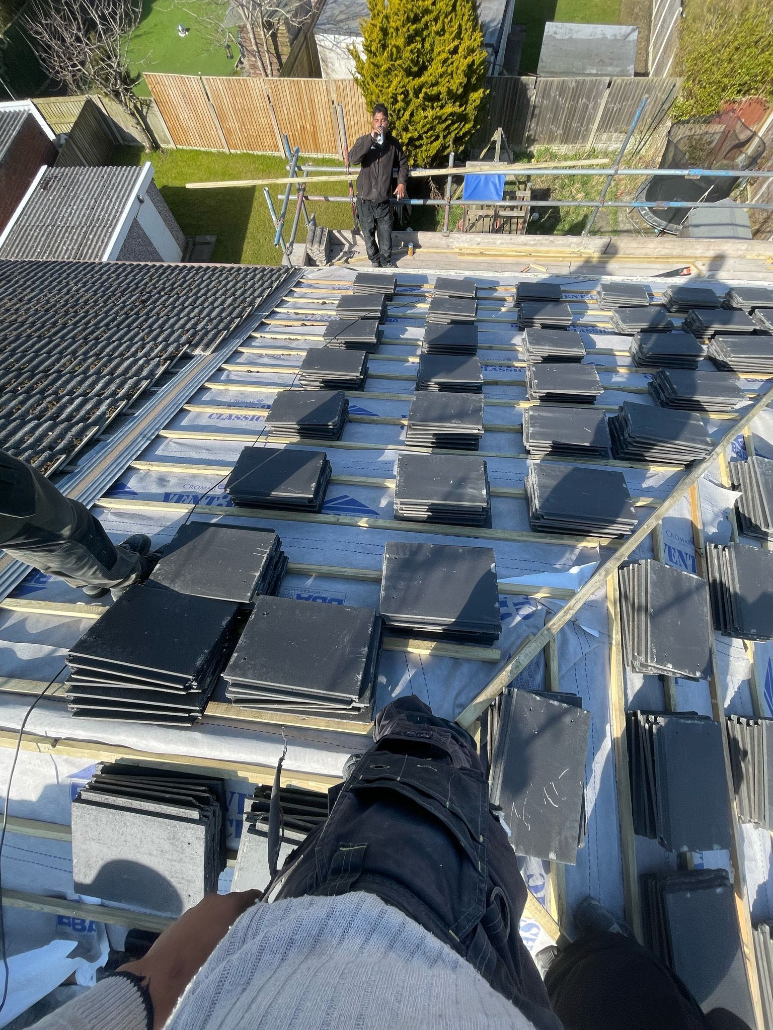 Professional roofers working on a property in London - KS Roof Master