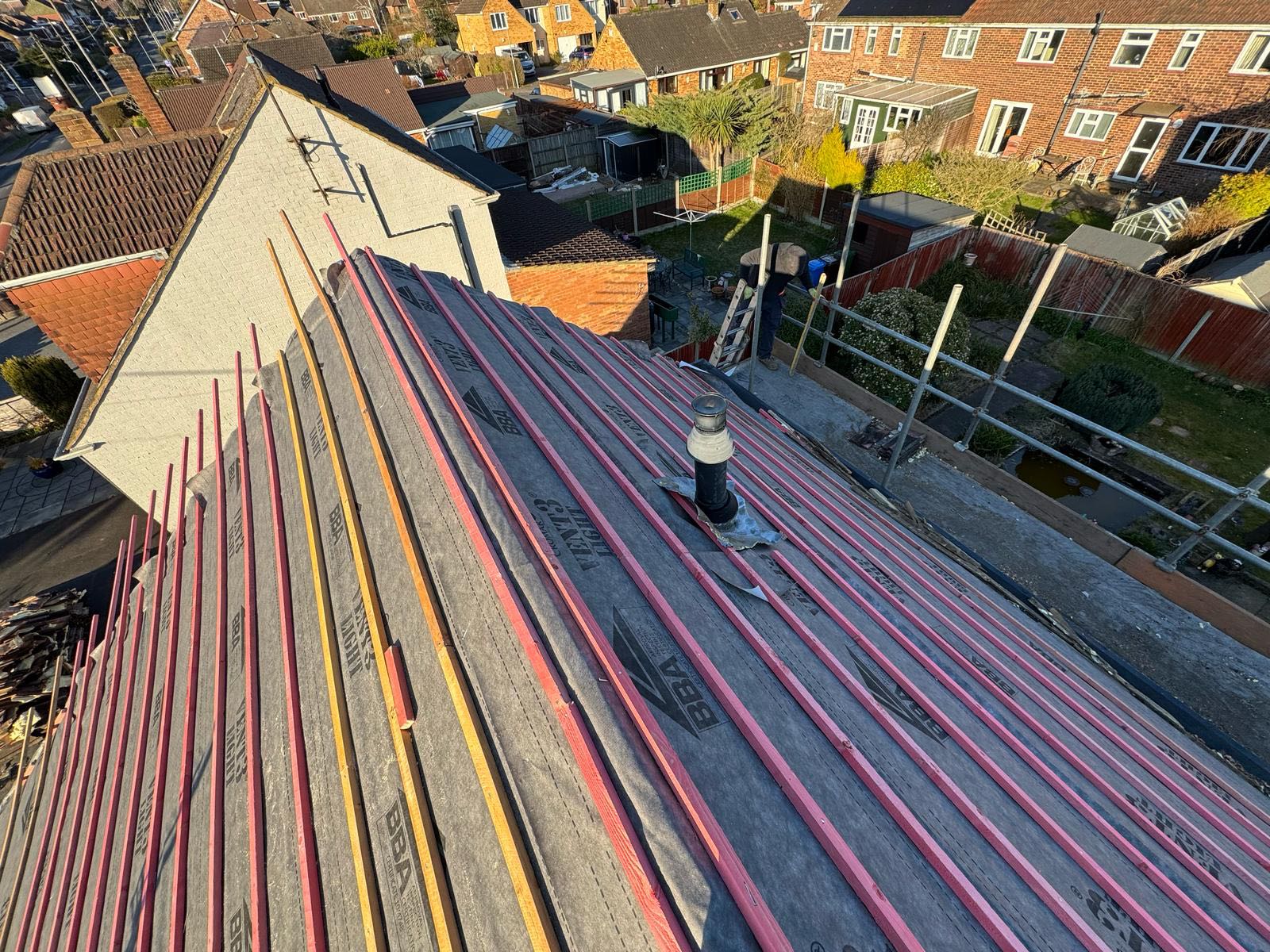 Professional roofers working on a property in London - KS Roof Master