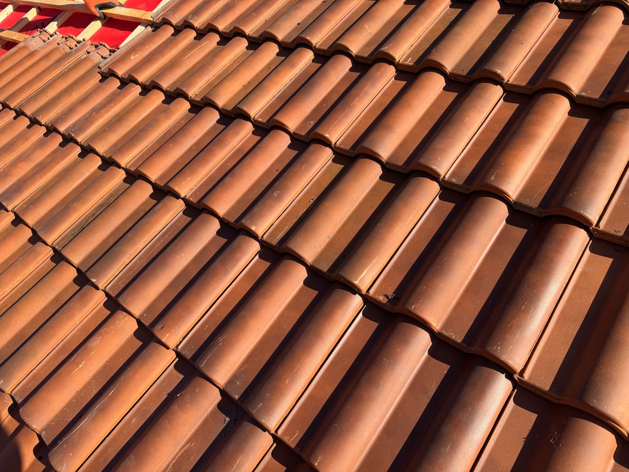 Professional roofers working on a property in London - KS Roof Master