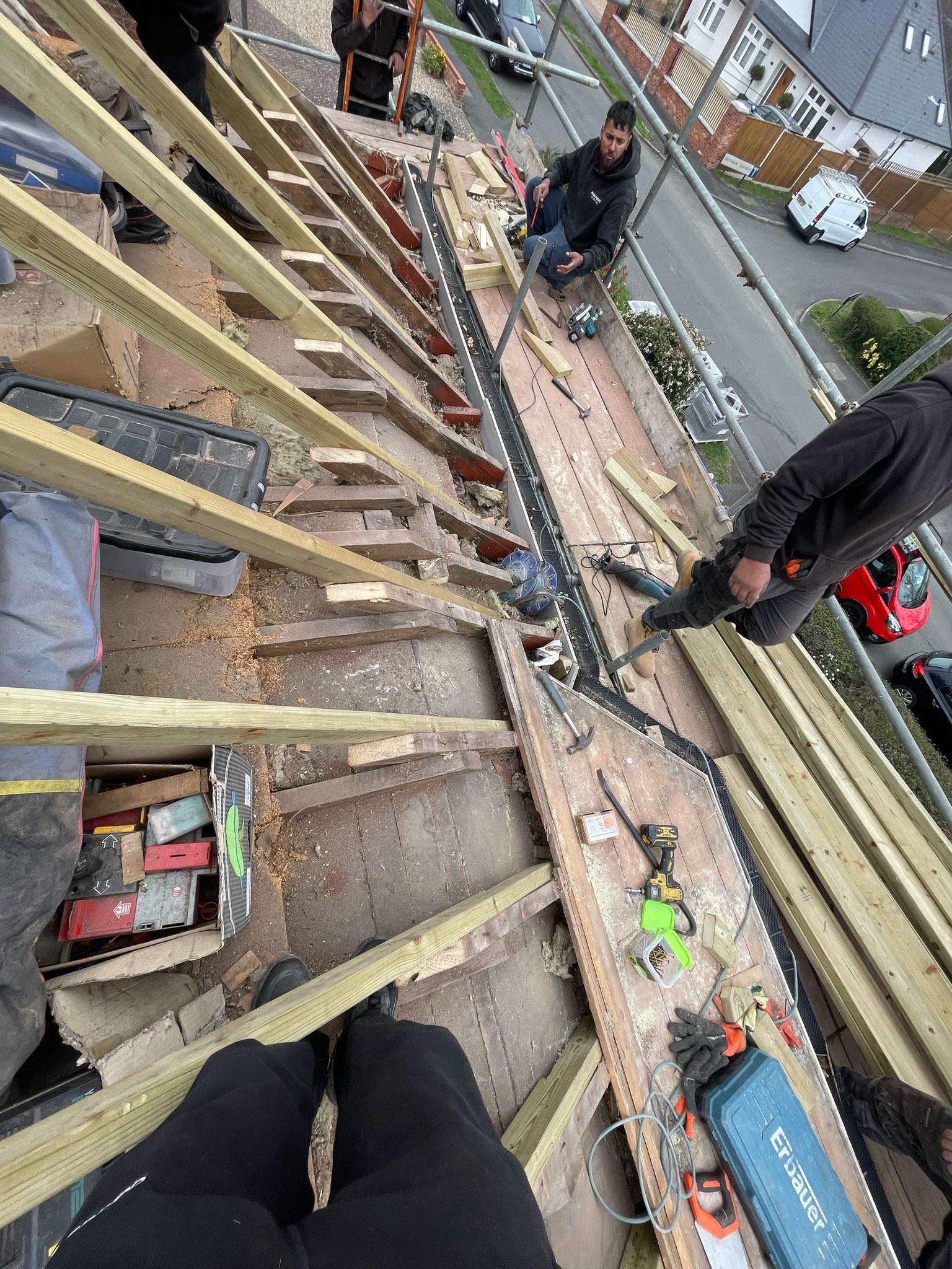 Professional roofers working on a property in London - KS Roof Master