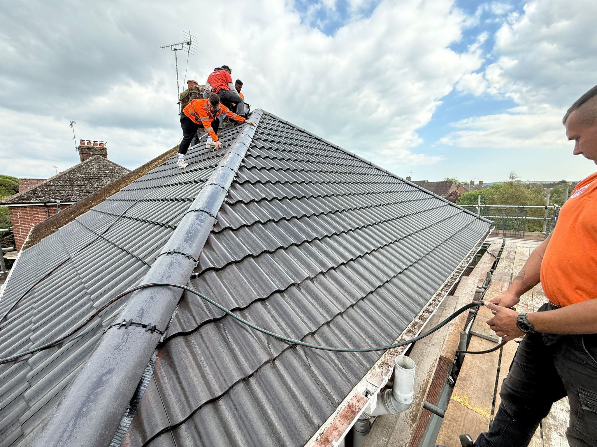 Professional roofers working on a property in London - KS Roof Master