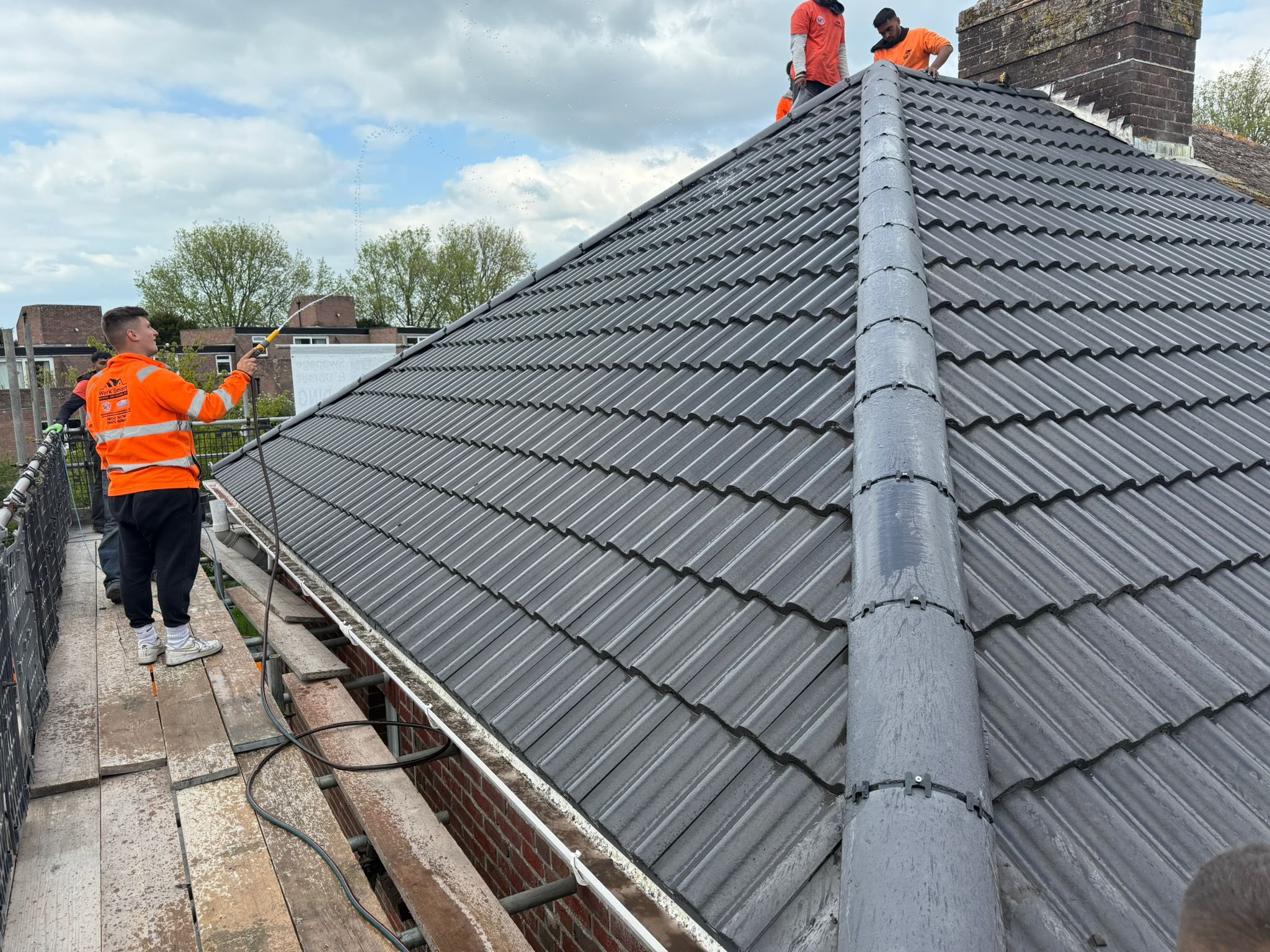 Professional roofers working on a property in London - KS Roof Master