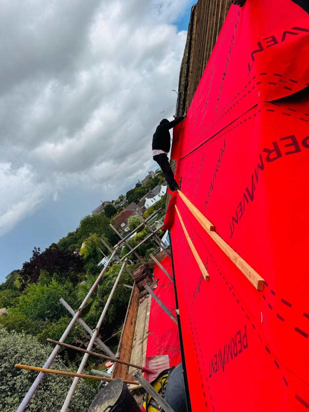 Professional roofers working on a property in London - KS Roof Master
