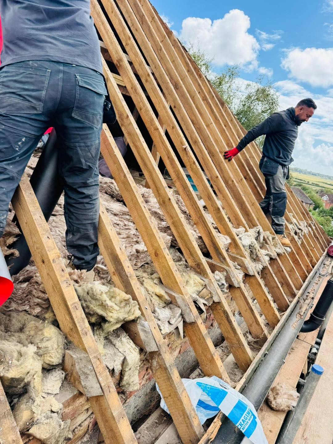 Professional roofers working on a property in London - KS Roof Master