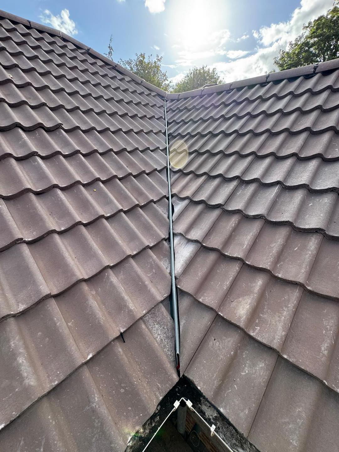 Professional roofers working on a property in London - KS Roof Master