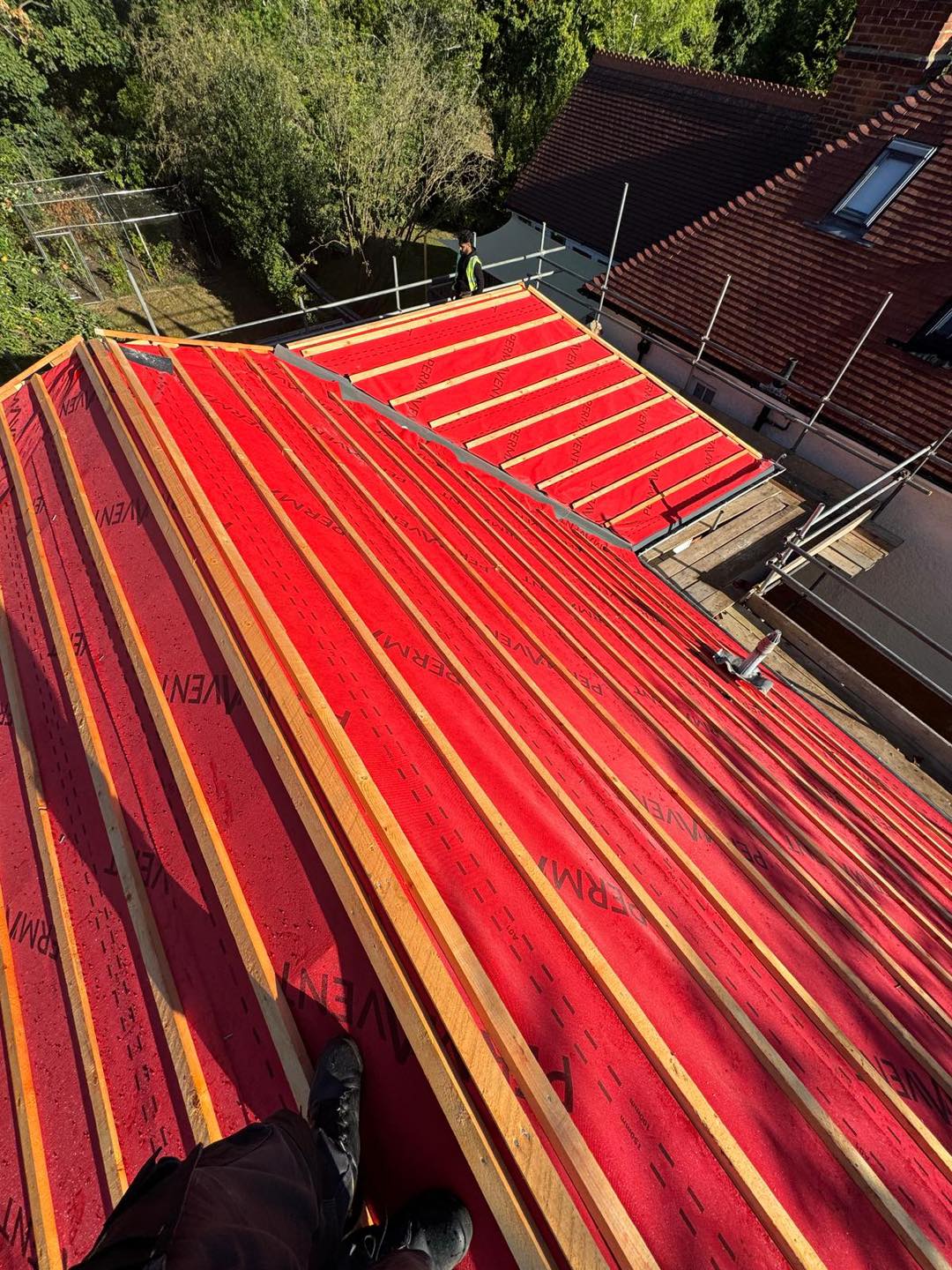 Professional roofers working on a property in London - KS Roof Master