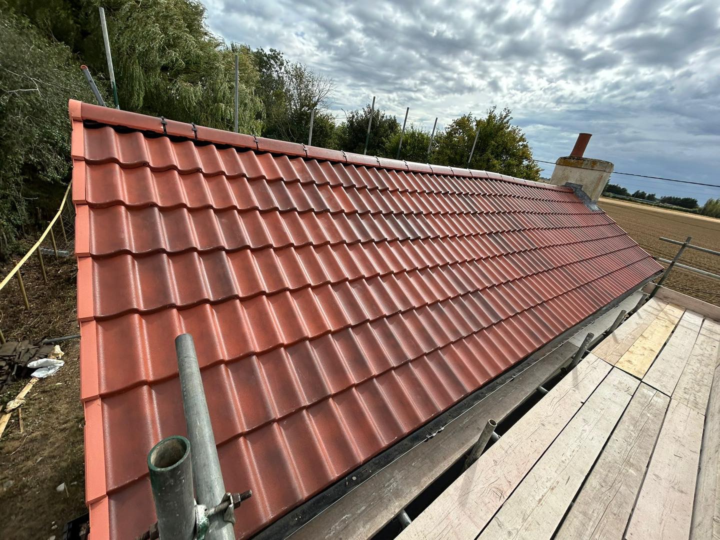 Professional roofers working on a property in London - KS Roof Master