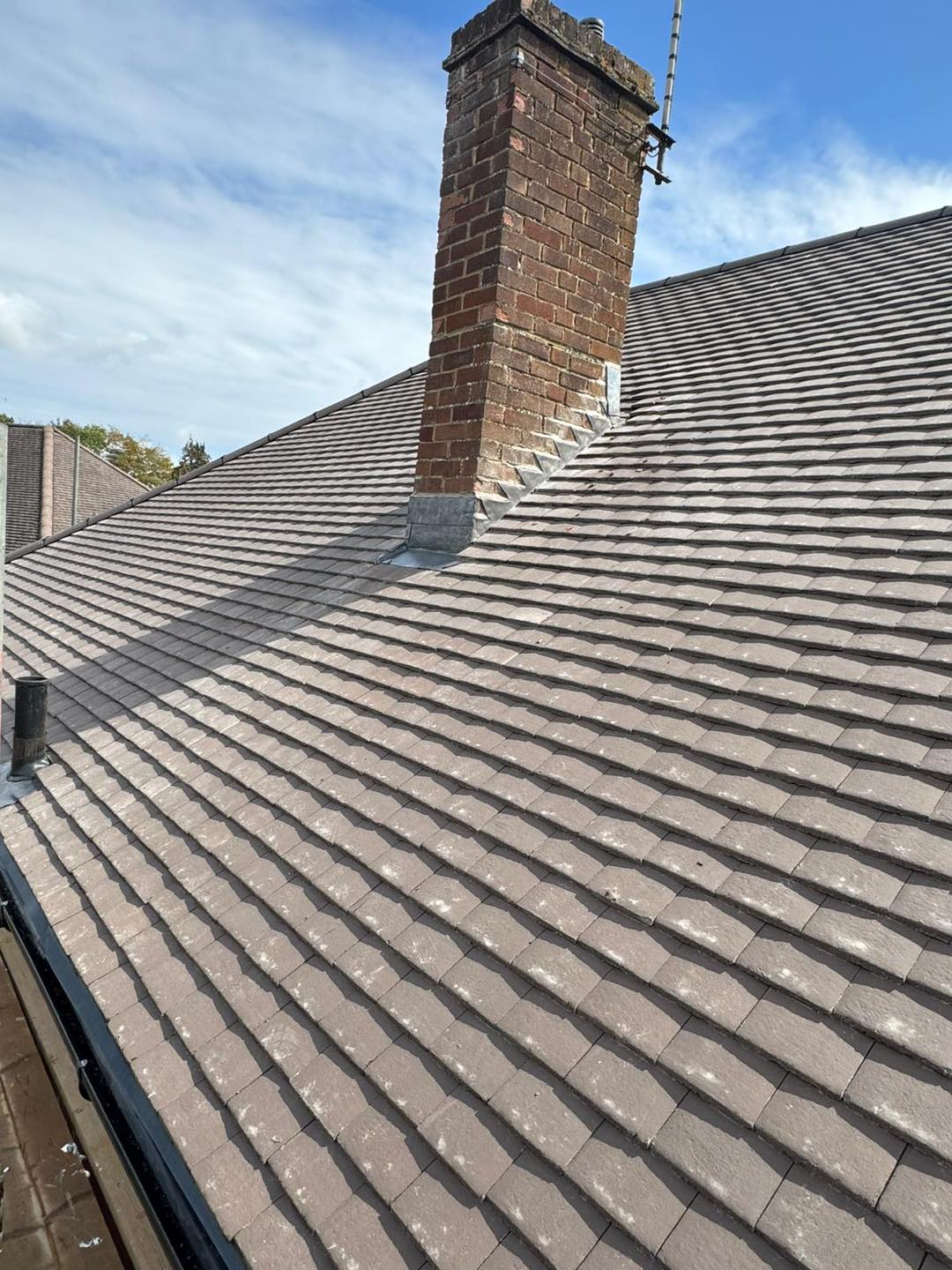 Professional roofers working on a property in London - KS Roof Master