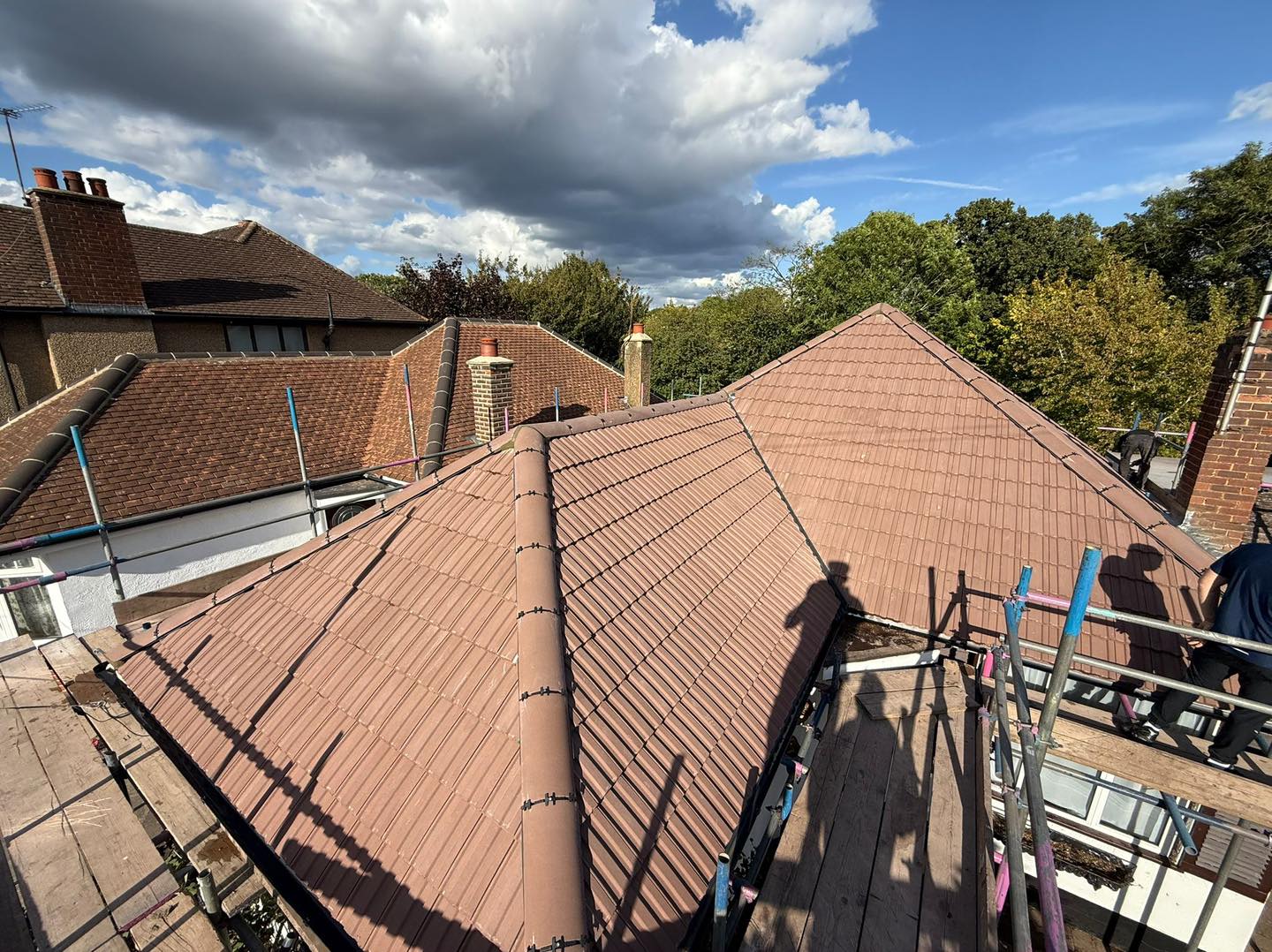 Professional roofers working on a property in London - KS Roof Master