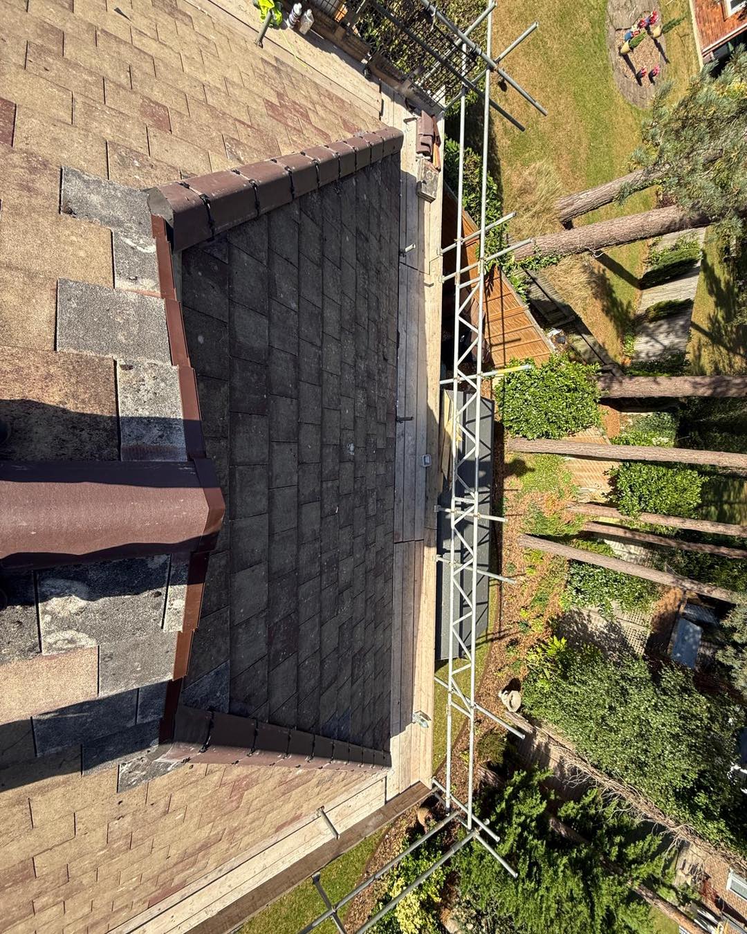 Professional roofers working on a property in London - KS Roof Master