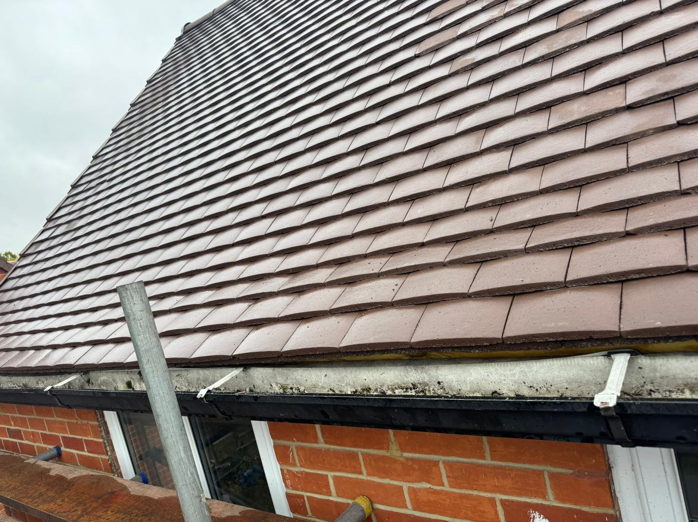 Professional roofers working on a property in London - KS Roof Master