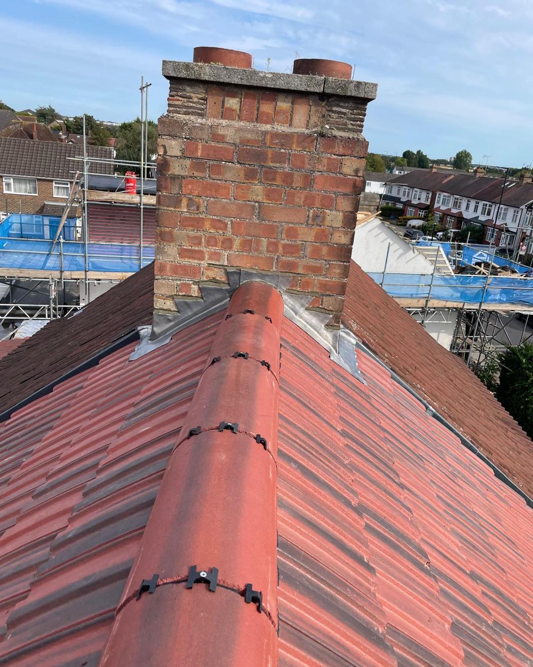 Professional roofers working on a property in London - KS Roof Master