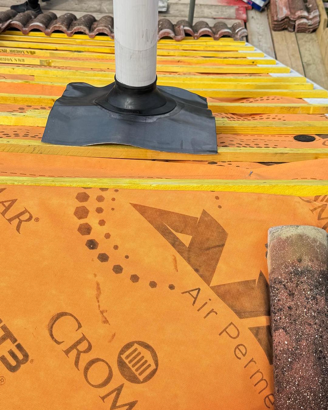 Professional roofers working on a property in London - KS Roof Master