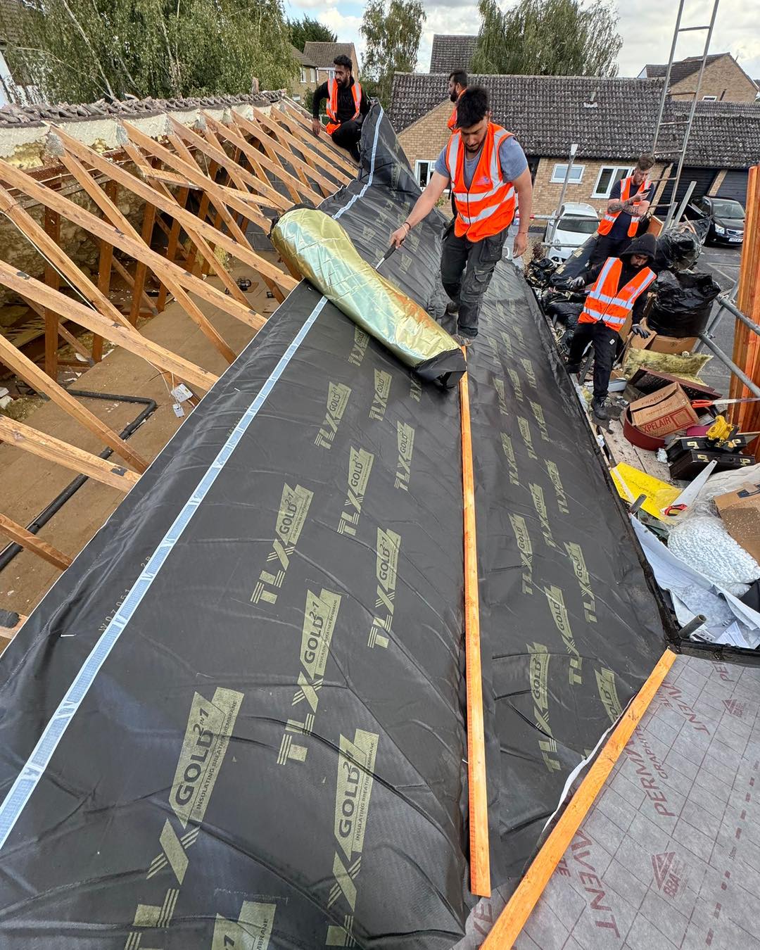 Professional roofers working on a property in London - KS Roof Master