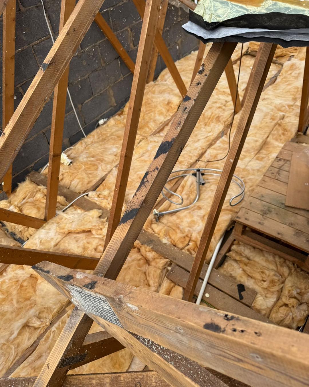 Professional roofers working on a property in London - KS Roof Master