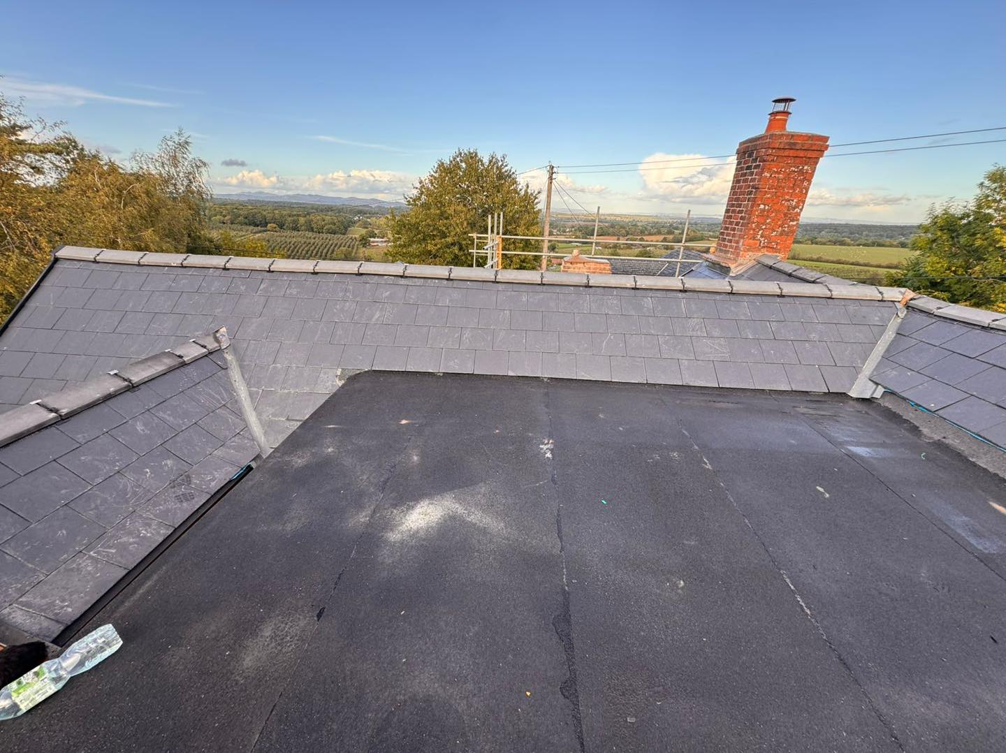 Professional roofers working on a property in London - KS Roof Master