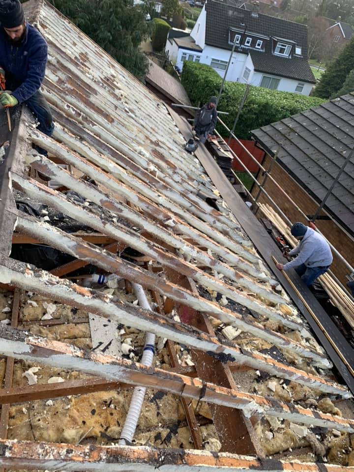 Professional roofers working on a property in London - KS Roof Master