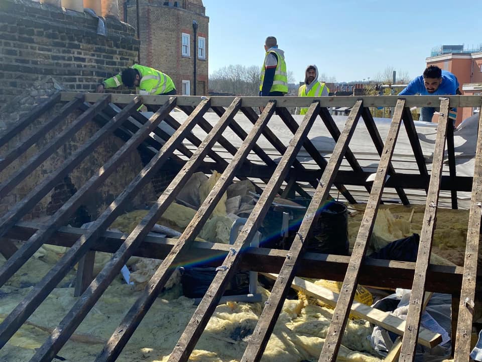 Professional roofers working on a property in London - KS Roof Master