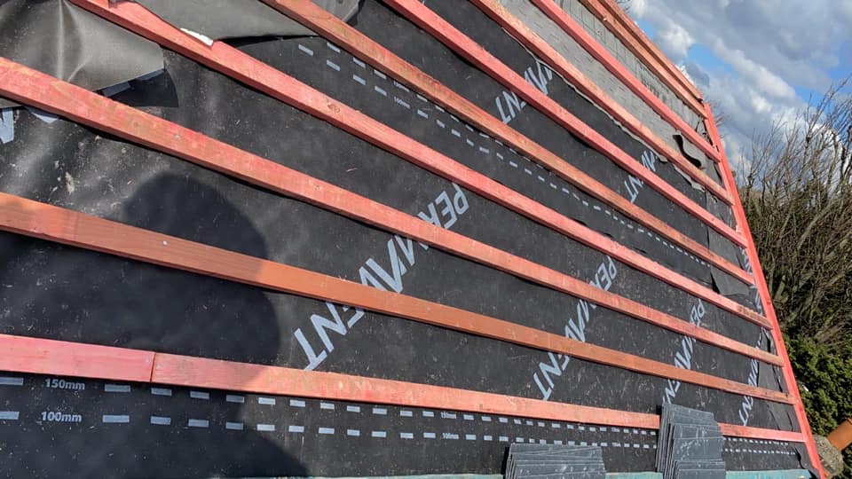 Professional roofers working on a property in London - KS Roof Master