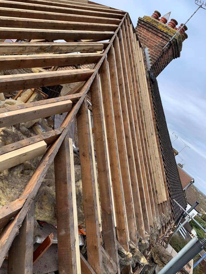 Professional roofers working on a property in London - KS Roof Master