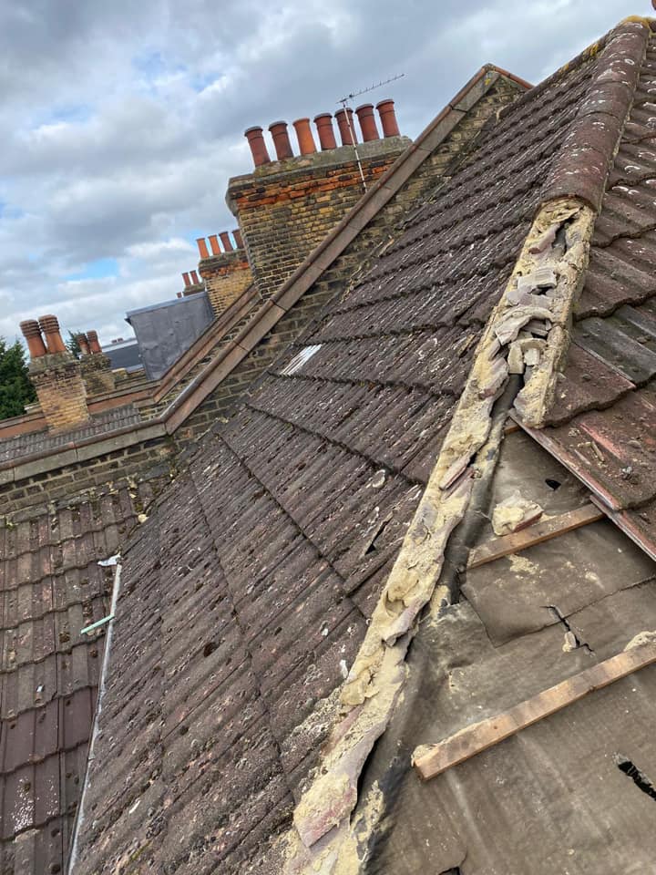 Professional roofers working on a property in London - KS Roof Master