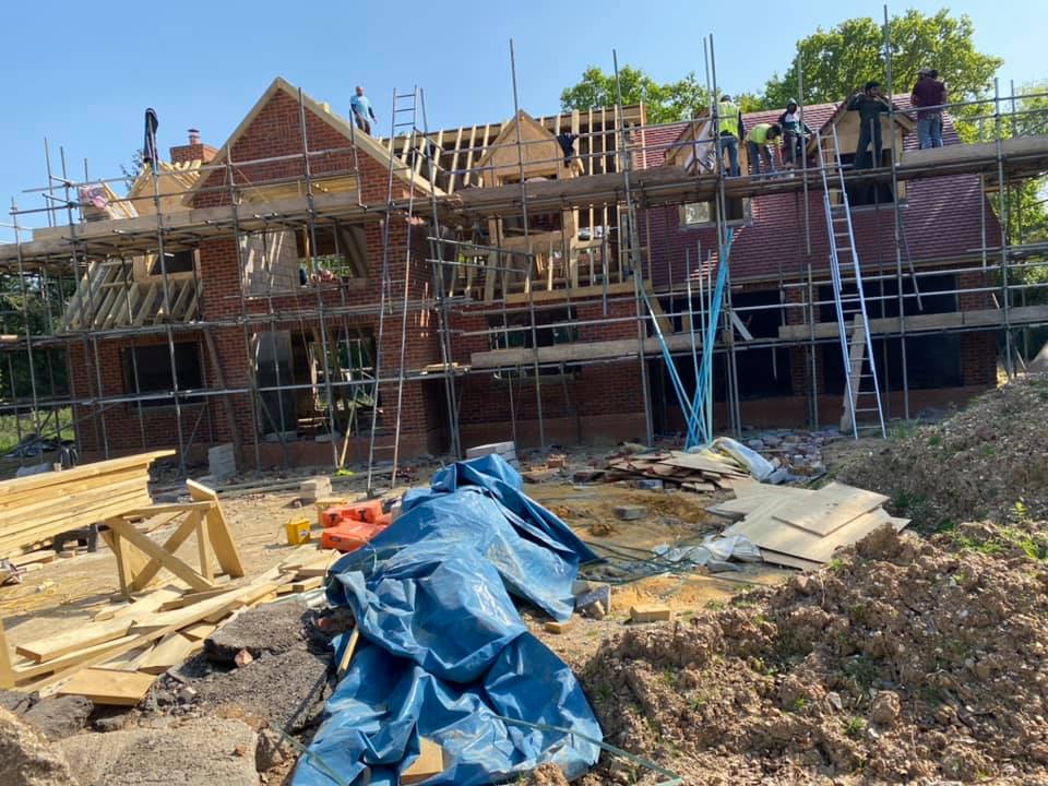 Professional roofers working on a property in London - KS Roof Master