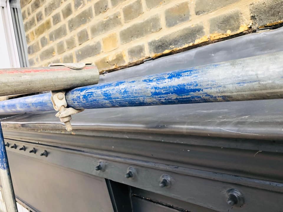 Professional roofers working on a property in London - KS Roof Master