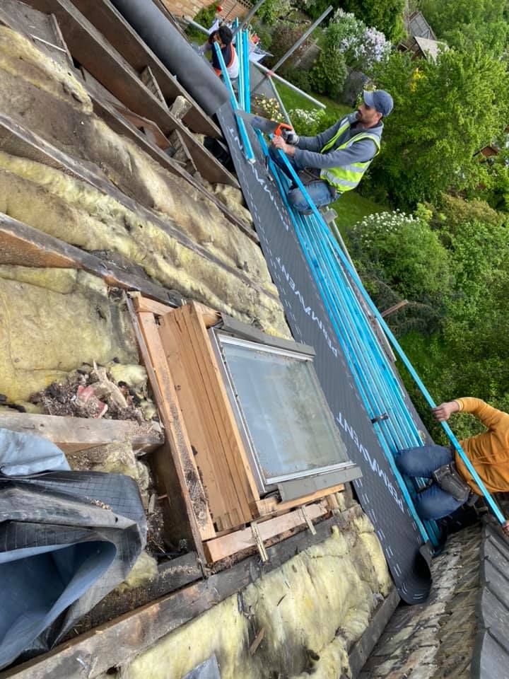 Professional roofers working on a property in London - KS Roof Master