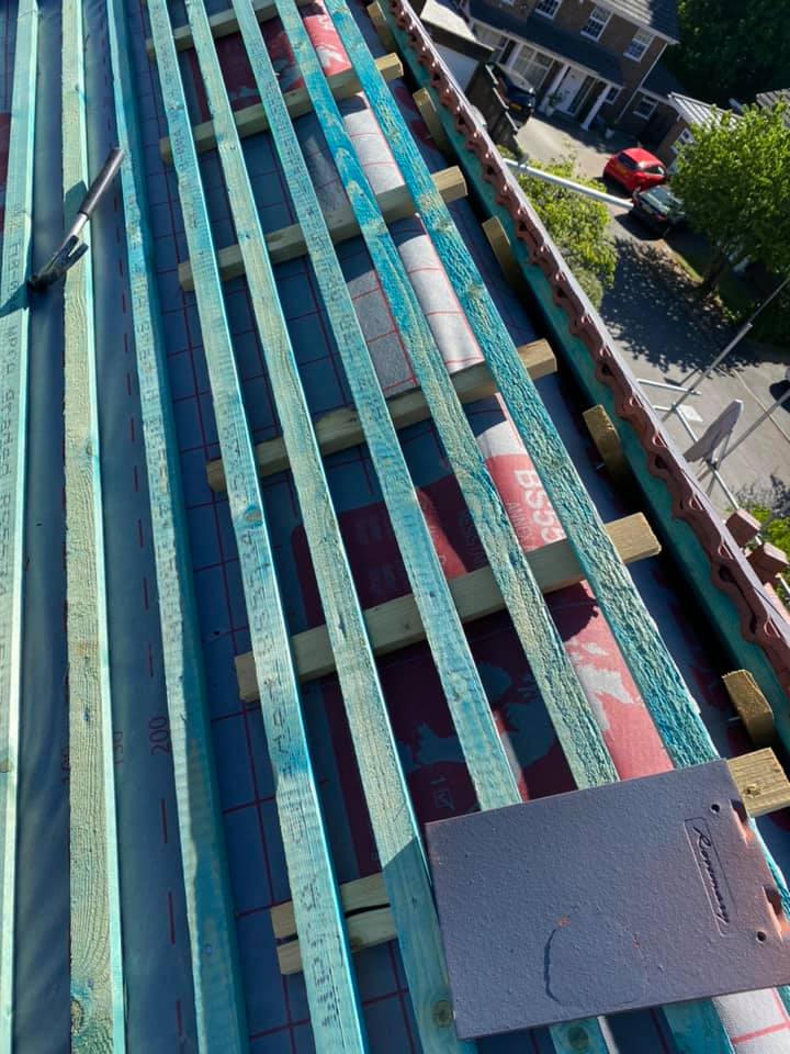 Professional roofers working on a property in London - KS Roof Master