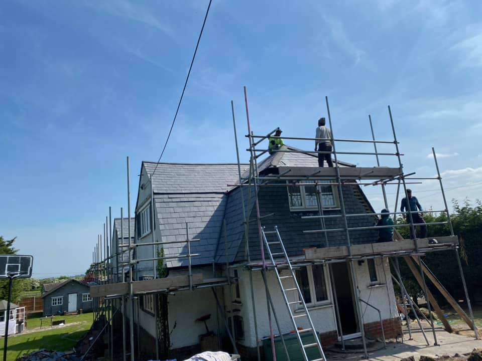 Professional roofers working on a property in London - KS Roof Master