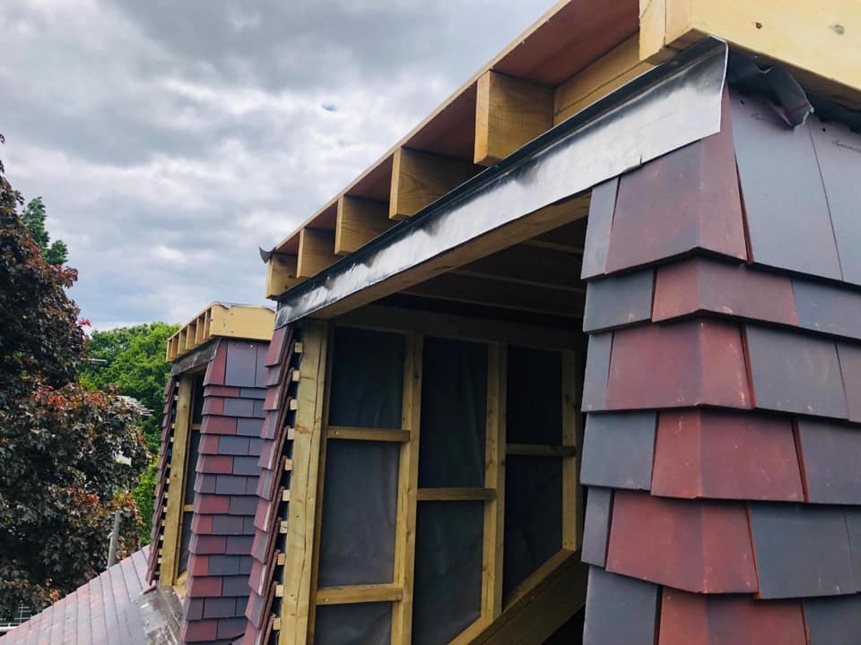 Professional roofers working on a property in London - KS Roof Master