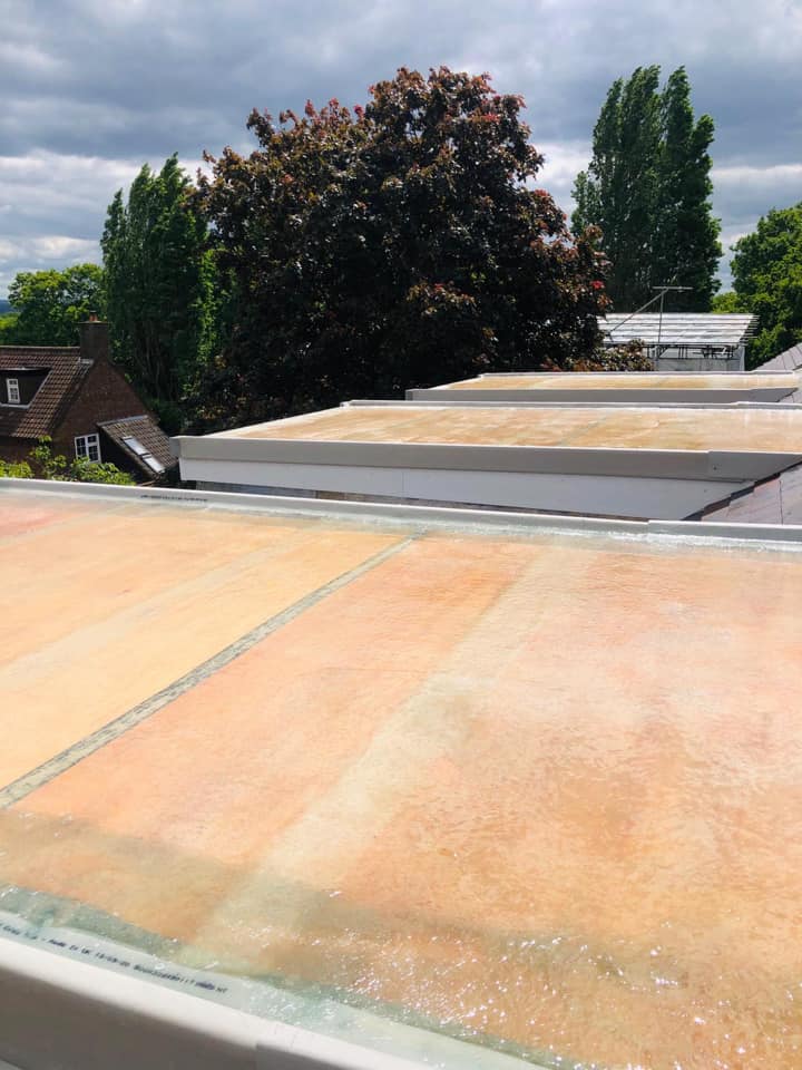 Professional roofers working on a property in London - KS Roof Master