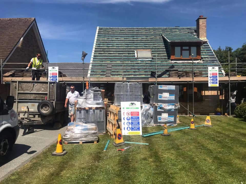 Professional roofers working on a property in London - KS Roof Master
