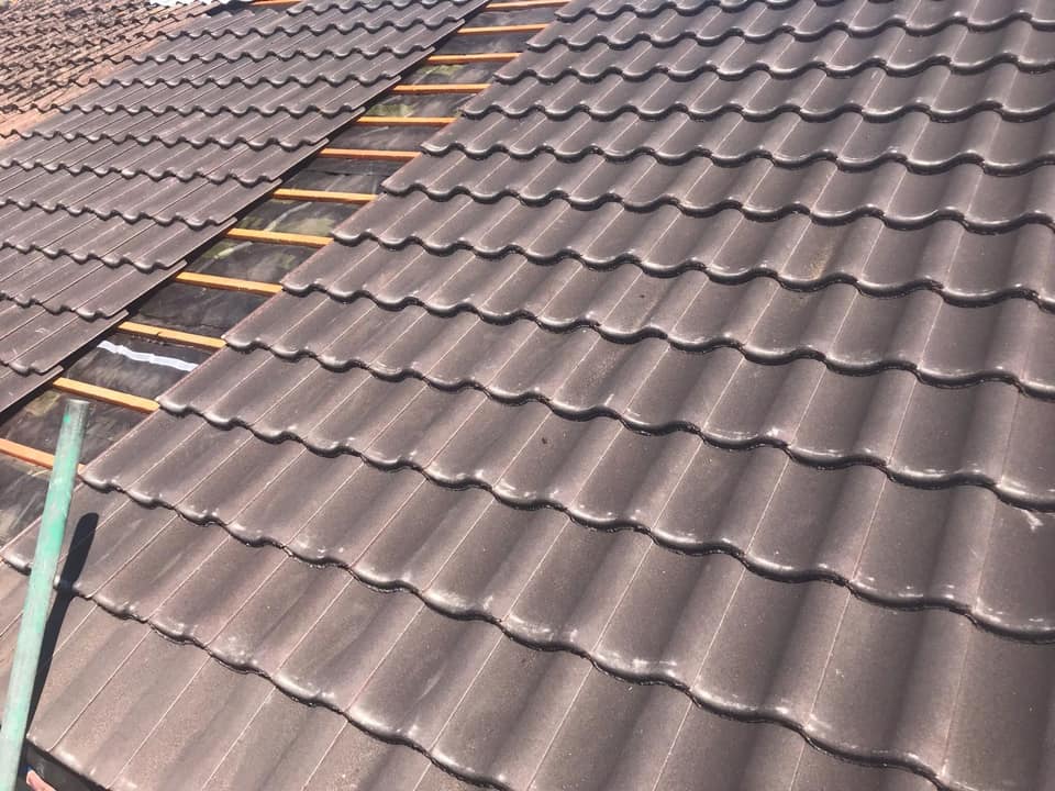 Professional roofers working on a property in London - KS Roof Master