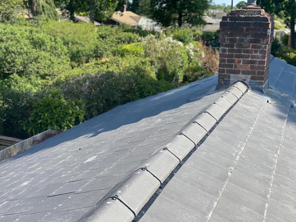 Professional roofers working on a property in London - KS Roof Master